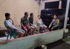 Bhabinkamtibmas Polsek Klari Sambangi Warga Saat Ronda Malam