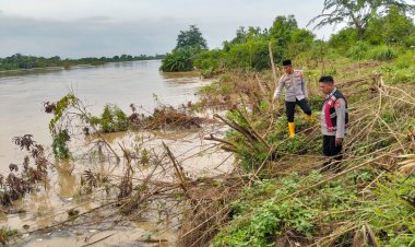 Kapolsek Batujaya Kontrol Debit Air Kali Citarum yang kembali banjir